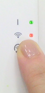 Then press and hold the Setting button on the W-LAN adapter for 3 seconds
